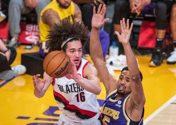 February 2, 2022, Los Angeles, California, USA: Talen Horton-Tucker 5 of the Los Angeles Lakers defends against CJ Elleby 16 of the Portland Trail Blazers during their NBA, Basketball Herren, USA game on Wednesday February 2, 2022 at Crypto.com Arena in Los Angeles, California. Lakers defeat Trailblazers, 99-94. PI Los Angeles USA - ZUMAp124 20220202_zaa_p124_028 Copyright: xJAVIERxROJASx