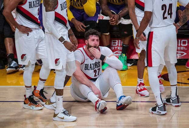 February 2, 2022, Los Angeles, California, USA: Jusuf Nurkic 27 of thePortland Trail Blazers checks his jaw after being fouled by Anthony Davis 3 of the Los Angeles Lakers during their NBA, Basketball Herren, USA game on Wednesday February 2, 2022 at Crypto.com Arena in Los Angeles, California. Lakers defeat Trailblazers, 99-94. PI Los Angeles USA - ZUMAp124 20220202_zaa_p124_036 Copyright: xJAVIERxROJASx