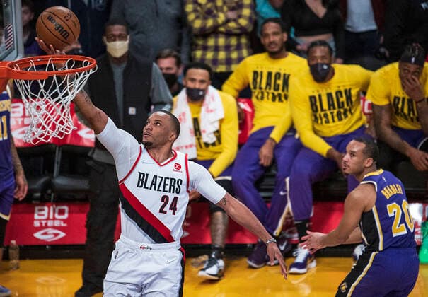 February 2, 2022, Los Angeles, California, USA: Norman Powell 24 of thePortland Trail Blazers puts up a layup during their NBA, Basketball Herren, USA game against the Los Angeles Lakers on Wednesday February 2, 2022 at Crypto.com Arena in Los Angeles, California. Lakers defeat Trailblazers, 99-94. PI Los Angeles USA - ZUMAp124 20220202_zaa_p124_039 Copyright: xJAVIERxROJASx