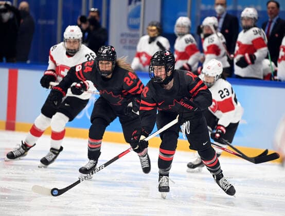 (220203) -- BEIJING, Feb. 3, 2022 -- Sarah Fillier (front) of Canada breaks through during the women s Ice hockey, Eishockey preliminary round Group A match between Canada and Switzerland at National Indoor Stadium in Beijing, China, Feb. 3, 2022. ) (BEIJING2022)CHINA-BEIJING-OLYMPIC Winter games, Winterspiele,Spiele, Summer games ICE HOCKEY-WOMEN S PRELIMINARY?(CN) LixZiheng 