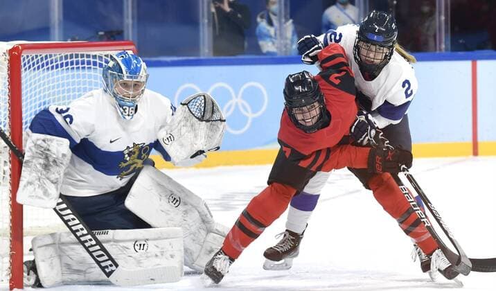 Goalie Anni Keisala and Sini Karjalainen (2) and Laura Stacey of Canada of Finland during women s Ice hockey, Eishockey preliminary round group A match between Finland and Canada at the Beijing Winter Olympic Games, Olympische Spiele, Olympia, OS in Wukesong Sports Centre in Beijing on February 5, 2022. Beijing China LKLAPJ20220205081437V630  Copyright: xJussixNukarix