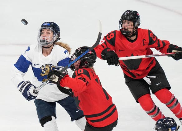 (220205) -- BEIJING, Feb. 5, 2022 -- Sarah Fillier (C) of Canada competes with Susanna Tapani of Finland during the women s Ice hockey, Eishockey preliminary round Group A match between Canada and Finland at National Indoor Stadium in Beijing, capital of China, Feb. 5, 2022. ) (XHTP)(BEIJING2022)CHINA-BEIJING-OLYMPIC Winter games, Winterspiele,Spiele, Summer games ICE HOCKEY-WOMEN S PRELIMINARY-CANADA VS FINLAND(CN) MengxYongmin 