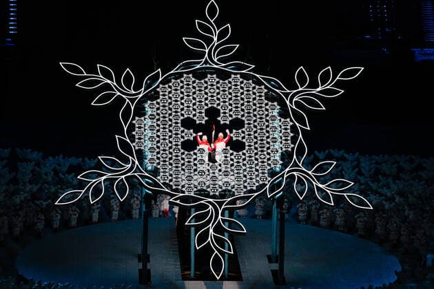 BEIJING, CHINA - FEBRUARY 04: Torch bearers Dinigeer Yilamujiang and Jiawen Zhao of Team China light the Olympic Cauldron during the Opening Ceremony of the Beijing 2022 Winter Olympics at the Beijing National Stadium on February 4, 2022 in Beijing, China.  Copyright: xVCGx CFP111367788730 