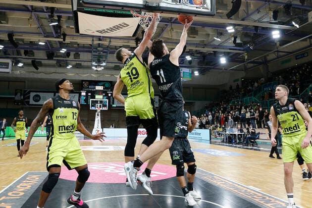 20 Matchday of the easyCredit BBL Basketball Bundesliga at Oberfrankenhalle in Bayreuth Season 2021 2022 Medi Bayreuth vs Hamburg Towers Martynas Sajus Medi Bayreuth 19 left Maik Kotsar Hamburg Towers 11 right