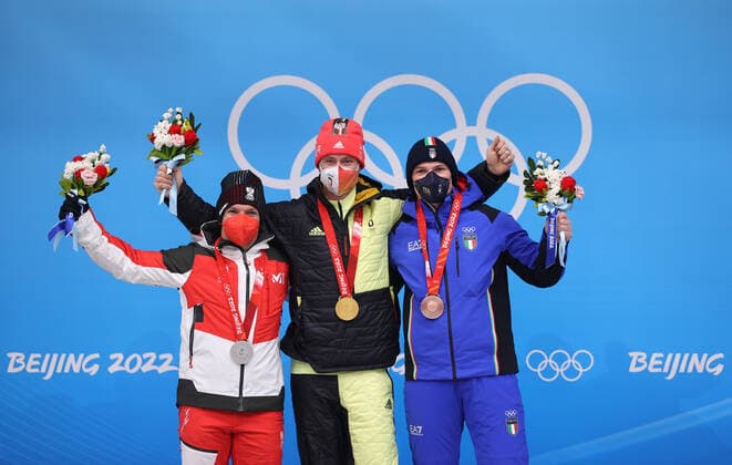 (220206) -- BEIJING, Feb. 6, 2022 -- Gold medalist Germany s Johannes Ludwig (C), silver medallist Austria s Wolfgang Kindl (L) and bronze medallist Italy s Dominik Fischnaller celebrate during the awarding ceremony after Men s Singles Run of luge event at the Yanqing National Sliding Centre in Yanqing district of Beijing, capital of China, Feb. 6, 2022. ) (BEIJING2022)CHINA-BEIJING-YANQING-OLYMPIC Winter games, Winterspiele,Spiele, Summer games LUGE-MEN S SINGLES-FINAL(CN) YaoxJianfeng 