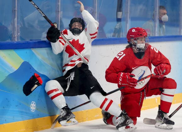 BEIJING, CHINA - FEBRUARY 7, 2022: Sarah Fillier (L) of Canada and Polina Bolgareva of the ROC Team fight for the puck in their women s Group A Ice hockey, Eishockey match at the 2022 Winter Olympic Games, Olympische Spiele, Olympia, OS at the Wukesong Sports Centre. Anton Novoderezhkin TASS  TS121B05