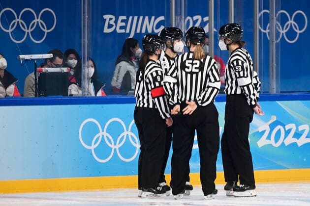 China Olympics 2022 Ice hockey, Eishockey Women ROC - Canada 8106658 07.02.2022 Referees wait for the beginning of the women s ice hockey preliminary round group A match between the Russian Olympic Committee s team and Canada during the Beijing 2022 Winter Olympic Games, Olympische Spiele, Olympia, OS at Wukesong Sports Centre in Beijing, China. Vladimir Astapkovich Sputnik Beijing China  Copyright: xVladimirxAstapkovichx