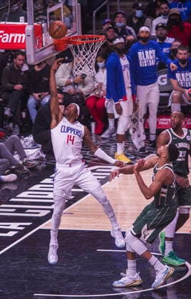 February 6, 2022, Los Angeles, California, USA: Terance Mann 14 of the Los Angeles Clippers scores during their NBA, Basketball Herren, USA game against the Milwaukee Bucks on Sunday February 6, 2022 at Crypto.com Arena in Los Angeles, California. Clippers lose to Bucks, 113-137. ARIANA RUIZ PI Los Angeles USA - ZUMAp124 20220206_zaa_p124_066 Copyright: xArianaxRuizx