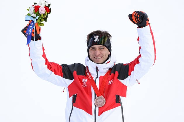 OLYMPICS - Winter Olympic Games, Olympische Spiele, Olympia, OS Beijing 2022 YANQING,CHINA,07.FEB.22 - OLYMPICS, ALPINE SKIING - Winter Olympic Games Beijing 2022, downhill, men, award ceremony. Image shows the rejoicing of Matthias Mayer (AUT). keywords: medal.  GEPAxpictures xHaraldxSteiner