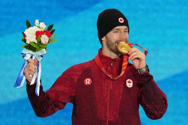 China Olympics 2022 Medal Ceremony 8107011 07.02.2022 Gold medallist Canada s Max Parrot celebrates on the podium during the medal ceremony for the men s snowboard slopestyle event of the Beijing 2022 Winter Olympic Games, Olympische Spiele, Olympia, OS at the Medals Plaza in Zhangjiakou, China. Pavel Bednyakov Sputnik Zhangjiakou China  Copyright: xPavelxBednyakovx