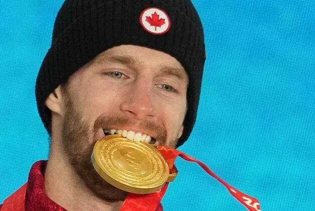 China Olympics 2022 Medal Ceremony 8107018 07.02.2022 Gold medallist Canada s Max Parrot celebrates on the podium during the medal ceremony for the men s snowboard slopestyle event of the Beijing 2022 Winter Olympic Games, Olympische Spiele, Olympia, OS at the Medals Plaza in Zhangjiakou, China. Pavel Bednyakov Sputnik Zhangjiakou China  Copyright: xPavelxBednyakovx