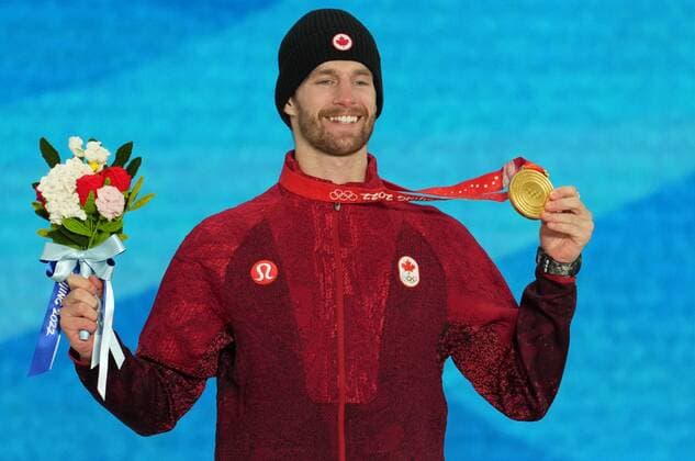 China Olympics 2022 Medal Ceremony 8107019 07.02.2022 Gold medallist Canada s Max Parrot celebrates on the podium during the medal ceremony for the men s snowboard slopestyle event of the Beijing 2022 Winter Olympic Games, Olympische Spiele, Olympia, OS at the Medals Plaza in Zhangjiakou, China. Pavel Bednyakov Sputnik Zhangjiakou China  Copyright: xPavelxBednyakovx