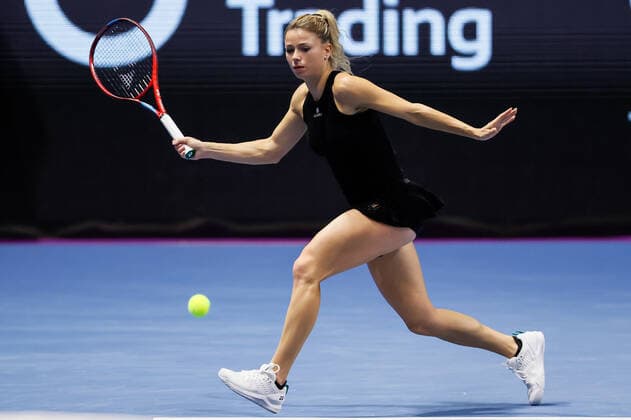 St. Petersburg Ladies Trophy 2022 - Day One Camila Giorgi of Italy returns the ball to Ekaterina Alexandrova of Russia during the women s singles Round of 32 match of the WTA, Tennis Damen 500 St. Petersburg Ladies Trophy 2022 International Tennis Tournament on February 7, 2022 at the Sibur Arena in Saint Petersburg, Russia. Saint Petersburg Russia  Copyright: xMikexKireevx originalFilename:kireev-stpeters220207_np4Q2.jpg