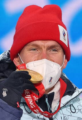 ZHANGJIAKOU, CHINA - FEBRUARY 7, 2022: ROC athlete Alexander Bolshunov celebrates his gold medal during the men s 15km+15km skiathlon victory ceremony at the Medal Plaza as part of the 2022 Winter Olympic Games, Olympische Spiele, Olympia, OS Sergei Bobylev TASS  TS121C78