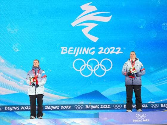 China Olympics 2022 Medal Ceremony 8107081 07.02.2022 Silver medalist Russian Olympic Committee s Denis Spitsov and gold medalist Russian Olympic Committee s Alexander Bolshunov pose on the podium during the medal ceremony for the men s cross-country skiathlon 2x15 km event of the Beijing 2022 Winter Olympic Games, Olympische Spiele, Olympia, OS at the Medal Plaza in Zhangjiakou, China. Pavel Bednyakov Sputnik Zhangjiakou China  Copyright: xPavelxBednyakovx