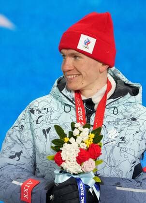 China Olympics 2022 Medal Ceremony 8107079 07.02.2022 Gold medalist Russian Olympic Committee s Alexander Bolshunov poses on the podium during the medal ceremony for the men s cross-country skiathlon 2x15 km event of the Beijing 2022 Winter Olympic Games, Olympische Spiele, Olympia, OS at the Medal Plaza in Zhangjiakou, China. Pavel Bednyakov Sputnik Zhangjiakou China  Copyright: xPavelxBednyakovx