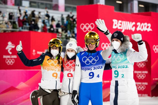 OLYMPICS - Winter Olympic Games, Olympische Spiele, Olympia, OS Beijing 2022 ZHANGJIAKOU,CHINA,07.FEB.22 - OLYMPICS, NORDIC SKIING, Ski jumping, Skispringen, Ski, nordisch - Winter Olympic Games Beijing 2022, normal hill, mixed team event. Image shows the rejoicing of Ursa Bogataj, Nika Kriznar, Peter Prevc and Timi Zajc (SLO). GEPAxpictures xMaticxKlansek