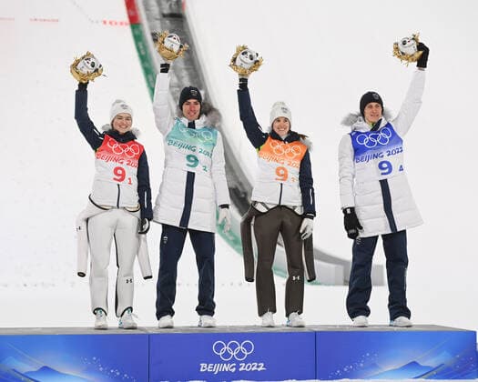 (220207) -- ZHANGJIAKOU, Feb. 7, 2022 -- Gold medalists of Team Slovenia celebrate during the flower ceremony of Ski jumping, Skispringen, Ski, nordisch Mixed Team Final Round at the National Ski Jumping Centre in Zhangjiakou, north China s Hebei Province, Feb. 7, 2022. ) (BEIJING2022) CHINA-ZHANGJIAKOU-OLYMPIC Winter games, Winterspiele,Spiele, Summer games SKI JUMPING-MIXED TEAM(CN) JiangxKehong