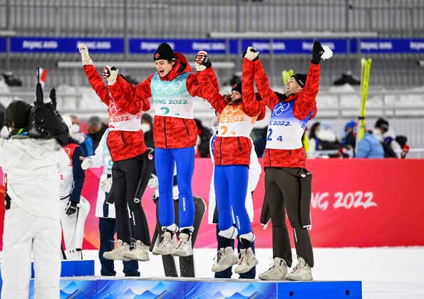 (220207) -- ZHANGJIAKOU, Feb. 7, 2022 -- Bronze medalists of Team Canada celebrate during the flower ceremony of Ski jumping, Skispringen, Ski, nordisch Mixed Team Final Round at the National Ski Jumping Centre in Zhangjiakou, north China s Hebei Province, Feb. 7, 2022. ) (BEIJING2022) CHINA-ZHANGJIAKOU-OLYMPIC Winter games, Winterspiele,Spiele, Summer games SKI JUMPING-MIXED TEAM(CN) FengxKaihua