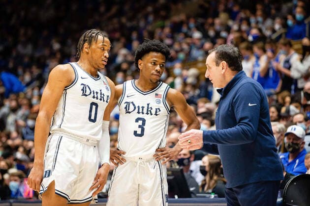 February 7, 2022: Duke Blue Devils forward Wendell Moore Jr. (0) and guard Jeremy Roach (3) talk with head coach Mike Krzyzewski during free throws by Virginia Cavaliers in first half of the ACC basketball matchup at Cameron Indoor in Durham, NC. ( Cal Media) Durham United States - ZUMAc04_ 20220207_zaf_c04_026 Copyright: xScottxKinserx