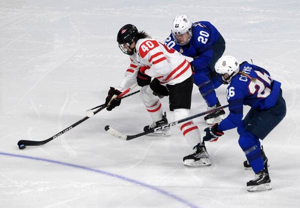 (220208) -- BEIJING, Feb. 8, 2022 -- Blayre Turnbull (L) of Canada vies with Kendall Coyne Schofield (R) and Hannah Brandt of the United States during the Ice hockey, Eishockey women s preliminary round group A match between Canada and the United States at Wukesong Sports Centre in Beijing, capital of China, Feb. 8, 2022. ) (BEIJING2022)CHINA-BEIJING-OLYMPIC Winter games, Winterspiele,Spiele, Summer games ICE HOCKEY-WOMEN S PRELIMINARY-CANADA VS U.S. (CN) LixAn 