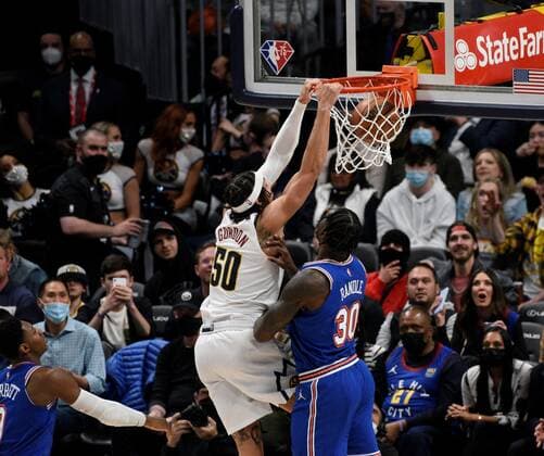 Denver Nuggets forward Aaron Gordon (up) goes in for the dunk against New York Knicks forward Julius Randle during a NBA, Basketball Herren, USA game at the Ball Arena in Denver, CO, USA, 08 February 2022. Denver Nuggets - New York Knicks !ACHTUNG: NUR REDAKTIONELLE NUTZUNG!  Copyright: xToddxPiersonx AME4572 20220209-db17f64044939e2e9432ca224436321a8ca94e57