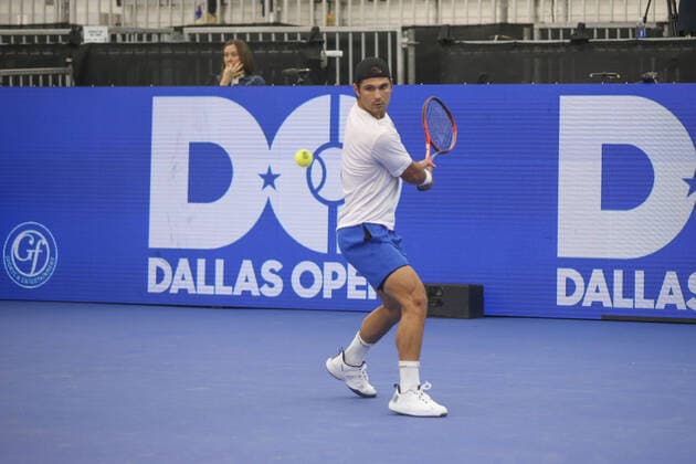 DALLAS, TX - FEBRUARY 08: Marcos Giron (USA) hits a backhand during the Dallas Open on February 8, 2022 at the Styslinger Altec Tennis Complex in Dallas, TX. (Photo by George Walker Icon Sportswire) TENNIS: FEB 08 Dallas Open Icon22020806