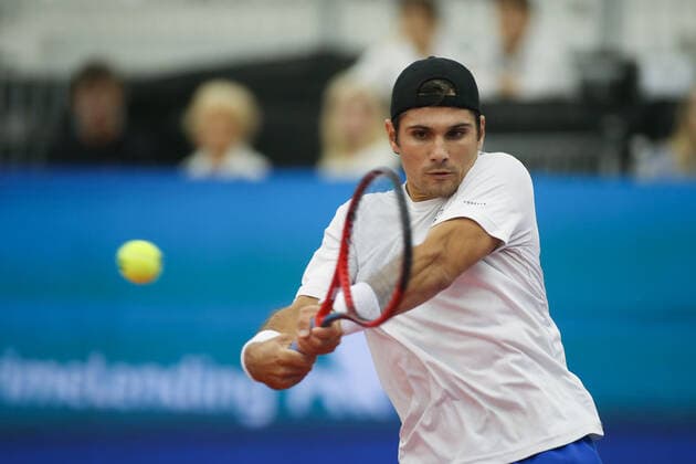 DALLAS, TX - FEBRUARY 08: Marcos Giron (USA) hits a backhand during the Dallas Open on February 8, 2022 at the Styslinger Altec Tennis Complex in Dallas, TX. (Photo by George Walker Icon Sportswire) TENNIS: FEB 08 Dallas Open Icon22020808