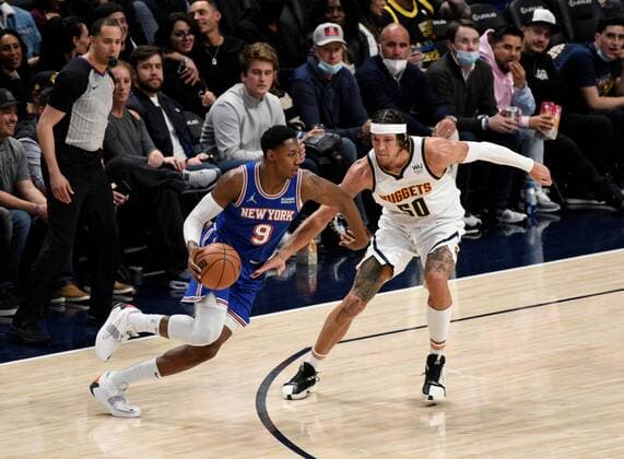 New York Knicks guard Davon Reed drives toward the basket against Denver Nuggets forward Aaron Gordon (R) during a NBA, Basketball Herren, USA game at the Ball Arena in Denver, CO, USA, 08 February 2022. Denver Nuggets - New York Knicks !ACHTUNG: NUR REDAKTIONELLE NUTZUNG!  Copyright: xToddxPiersonx AME4581 20220209-cd5847f1fd37bf2fbccd0e09129cc4541f147875