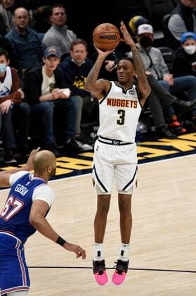 Denver Nuggets guard Bones Hyland goes up for a shot against New York Knicks center Taj Gibson (L) during a NBA, Basketball Herren, USA game at the Ball Arena in Denver, CO, USA, 08 February 2022. Denver Nuggets - New York Knicks !ACHTUNG: NUR REDAKTIONELLE NUTZUNG!  Copyright: xToddxPiersonx AME4580 20220209-61a7a092f3bbfb0aab925d2b68742ebeab389140