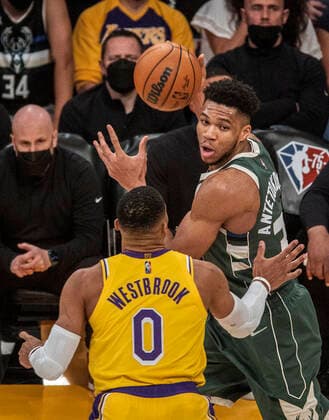 February 8, 2022, Los Angeles, California, USA: Giannis Antetokounmpo 34 of the Milwaukee Bucks is defended by Russell Westbrook 0 of the Los Angeles Lakers during their NBA, Basketball Herren, USA game on Tuesday February 8, 2022 at Crypto.com Arena in Los Angeles, California. Lakers lose to Bucks, 116-131. PI Los Angeles USA - ZUMAp124 20220208_zaa_p124_002 Copyright: xJAVIERxROJASx