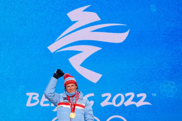 ZHANGJIAKOU, CHINA - FEBRUARY 9, 2022: Athlete Johannes Hosflot Klaebo of Norway celebrates his gold medal during the men s cross-country sprint freestyle victory ceremony at the Medal Plaza as part of the 2022 Winter Olympic Games, Olympische Spiele, Olympia, OS Sergei Bobylev TASS  TS12219B
