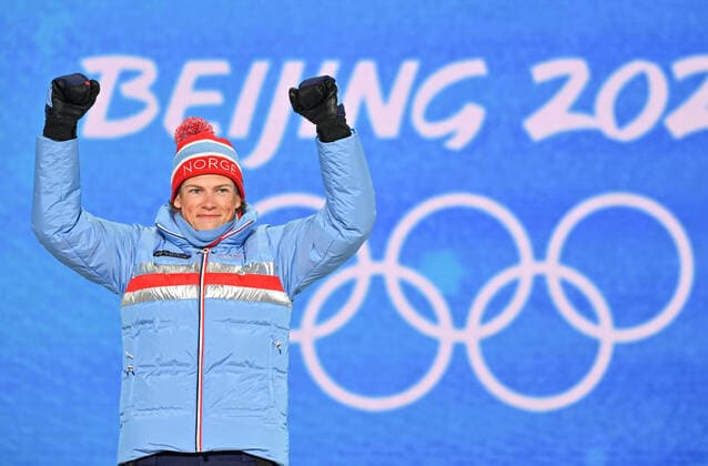 (220209) -- ZHANGJIAKOU, Feb. 9, 2022 -- Gold medalist Johannes Hoesflot Klaebo of Norway reacts during the awarding ceremony of men s cross-country skiing sprint free at Zhangjiakou Medals Plaza of the Winter Olympics in Zhangjiakou, north China s Hebei Province, Feb. 9, 2022. ) (BEIJING2022)CHINA- ZHANGJIAKOU-OLYMPIC Winter games, Winterspiele,Spiele, Summer games AWARDING CEREMONY (CN) GuoxCheng 
