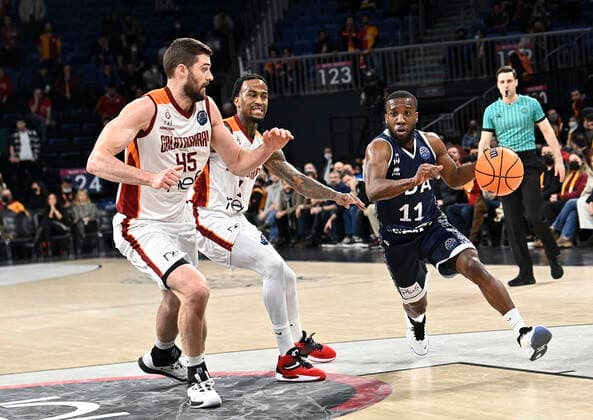 Dee Bost (1) , David Kravish (45) of Galatasaray Nef and David Holston (11) of JDA Dijon Basket during the FIBA Champions League Group I Play off match between Galatasaray NEF and JDA Dijon Basket at Sinan Erdem Arena in Istanbul , Turkey on February 09 , 2022. ( Photo by Seskimphoto ) 