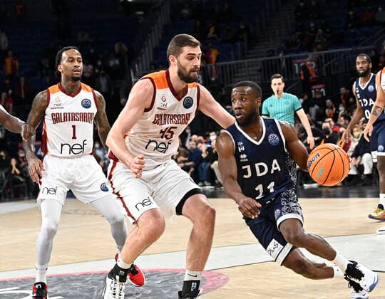 Dee Bost (1) , David Kravish (45) of Galatasaray Nef and David Holston (11) of JDA Dijon Basket during the FIBA Champions League Group I Play off match between Galatasaray NEF and JDA Dijon Basket at Sinan Erdem Arena in Istanbul , Turkey on February 09 , 2022. ( Photo by Seskimphoto ) 
