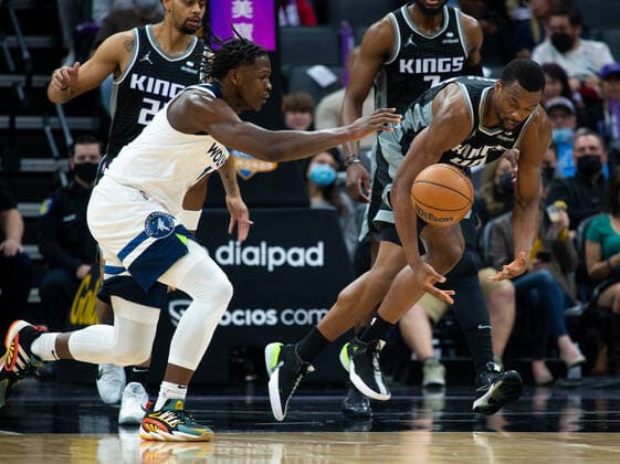 February 9, 2022, Sacramento, CA, USA: Sacramento Kings forward Harrison Barnes (40) battles Minnesota Timberwolves forward Anthony Edwards (1) for control of the ball in the first quarter during a game at Golden 1 Center on Wednesday, Feb. 9, 2022 in Sacramento. Sacramento USA - ZUMAj89_ 20220209_zaf_j89_011 Copyright: xPaulxKitagakixJr.x