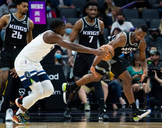 February 9, 2022, Sacramento, CA, USA: Sacramento Kings forward Harrison Barnes (40) battles Minnesota Timberwolves forward Anthony Edwards (1) for control of the ball in the first quarter during a game at Golden 1 Center on Wednesday, Feb. 9, 2022 in Sacramento. Sacramento USA - ZUMAj89_ 20220209_zaf_j89_012 Copyright: xPaulxKitagakixJr.x