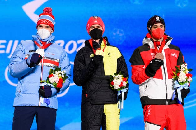 220210 Jorgen Graabak of Norway, Vinzenz Geiger of Germany and Lukas Greiderer of Austria celebrates with medals at the medal ceremony for men nord s nordic combined individual during day 6 of the 2022 Winter Olympics on February 10, 2022 in Zhangjiakou Photo Vegard Grott BILDBYRAN kod VG VG0235 skidor nordic combined nordisk komination olympic games olympics winter olympics os ol olympiska spel vinter os olympiske leker peking peking 2022 beijing 2022 beijing 2022 olympic games beijing 2022 winter olympic games peking os beijing ol vinter ol bbeng medaljeseremoni medaljceremoni medal ceremony norge norway celebration jubel silver,  Copyright: VEGARDxGRoTT BB220210VG051