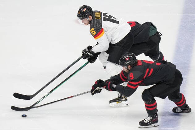 (220210) -- BEIJING, Feb. 10, 2022 -- Corban Knight (front) of Canada vies with Stefan Loibl of Germany during Ice hockey, Eishockey men s Group A match between Canada and Germany at Wukesong Sports Centre in Beijing, capital of China, Feb. 10, 2022. ) (BEIJING2022)CHINA-BEIJING-OLYMPIC Winter games, Winterspiele,Spiele, Summer games ICE HOCKEY-MEN S PRELIMINARY-CANADA VS GERMANY (CN) MengxYongmin 