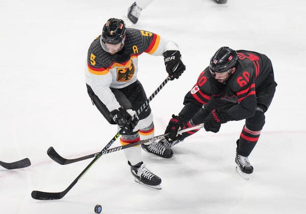 (220210) -- BEIJING, Feb. 10, 2022 -- Jason Demers (R) of Canada vies with Korbinian Holzer of Germany during Ice hockey, Eishockey men s Group A match between Canada and Germany at Wukesong Sports Centre in Beijing, capital of China, Feb. 10, 2022. ) (BEIJING2022)CHINA-BEIJING-OLYMPIC Winter games, Winterspiele,Spiele, Summer games ICE HOCKEY-MEN S PRELIMINARY-CANADA VS GERMANY (CN) MengxYongmin 