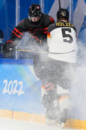 Canada s Jack Mcbain and German Korbinian Holzer pictured in action during the match Canada versus Germany in the men s Ice hockey, Eishockey tournament, at the Beijing 2022 Winter Olympics in Beijing, China, Thursday 10 February 2022. The winter Olympics are taking place from 4 February to 20 February 2022. LAURIExDIEFFEMBACQ  x8739435x
