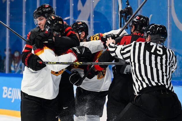 Canada s Owen Power, German Yasin Ehliz, German Patrick Hager and Canada s Mark Barberio fight during the match Canada versus Germany in the men s Ice hockey, Eishockey tournament, at the Beijing 2022 Winter Olympics in Beijing, China, Thursday 10 February 2022. The winter Olympics are taking place from 4 February to 20 February 2022. LAURIExDIEFFEMBACQ  x8739520x