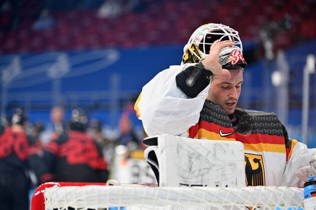 (220210) -- BEIJING, Feb. 10, 2022 -- Mathias Niederberger of Germany reacts during Ice hockey, Eishockey men s Group A match between Canada and Germany at Wukesong Sports Centre in Beijing, capital of China, Feb. 10, 2022. ) (BEIJING2022)CHINA-BEIJING-OLYMPIC Winter games, Winterspiele,Spiele, Summer games ICE HOCKEY-MEN S PRELIMINARY-CANADA VS GERMANY (CN) LixRan 