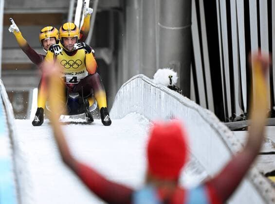 China Olympics 2022 Luge Team Relay 8110769 10.02.2022 Germany s Tobias Wendl and Tobias Arlt cheer at the finish line in the luge team relay competition during the Beijing 2022 Winter Olympic Games, Olympische Spiele, Olympia, OS at the National Sliding Centre in Yanqing, China. Vladimir Astapkovich Sputnik Beijing China  Copyright: xVladimirxAstapkovichx
