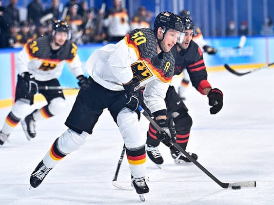 (220210) -- BEIJING, Feb. 10, 2022 -- Patrick Hager (front) of Germany competes during Ice hockey, Eishockey men s Group A match between Canada and Germany at Wukesong Sports Centre in Beijing, capital of China, Feb. 10, 2022. ) (BEIJING2022)CHINA-BEIJING-OLYMPIC Winter games, Winterspiele,Spiele, Summer games ICE HOCKEY-MEN S PRELIMINARY-CANADA VS GERMANY (CN) SongxYanhua 