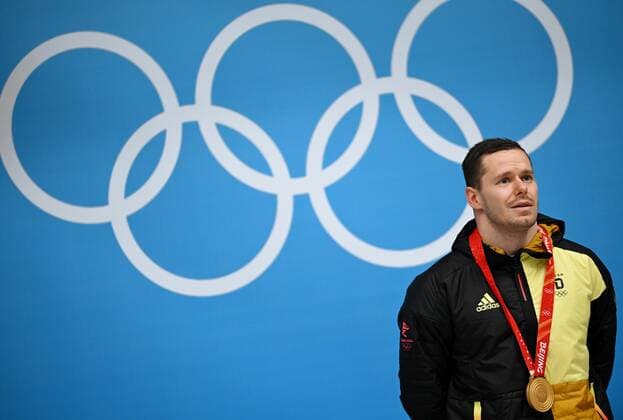 China Olympics 2022 Medal Ceremony 8111661 11.02.2022 Gold medalist Germany s Christopher Grotheer poses on the podium during the medal ceremony for the men s skeleton event of the Beijing 2022 Winter Olympic Games, Olympische Spiele, Olympia, OS at the National Sliding Centre in Yanqing, China. Vladimir Astapkovich Sputnik Yanqing China  Copyright: xVladimirxAstapkovichx