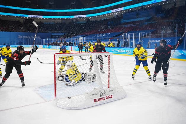 (220211) -- BEIJING, Feb. 11, 2022 -- Sarah Nurse (2nd L) of Canada scores a goal during the Ice hockey, Eishockey women s play-off quarterfinal between Canada and Sweden at Wukesong Sports Centre in Beijing, capital of China, Feb. 11, 2022. ) (BEIJING2022)CHINA-BEIJING-ICE HOCKEY-WOMEN S PLAY-OFF-QUARTERFINAL-CAN VS SWE (CN) LixRan 