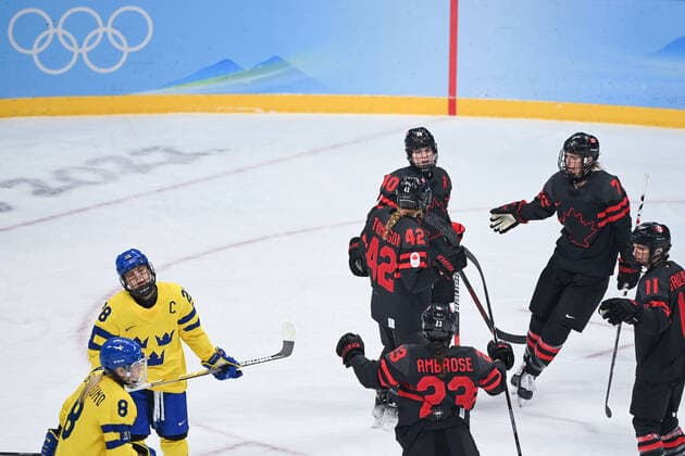 (220211) -- BEIJING, Feb. 11, 2022 -- Players of Canada celebrate scoring during the Ice hockey, Eishockey women s play-off quarterfinal between Canada and Sweden at Wukesong Sports Centre in Beijing, capital of China, Feb. 11, 2022. ) (BEIJING2022)CHINA-BEIJING-ICE HOCKEY-WOMEN S PLAY-OFF-QUARTERFINAL-CAN VS SWE (CN) HuangxZongzhi 
