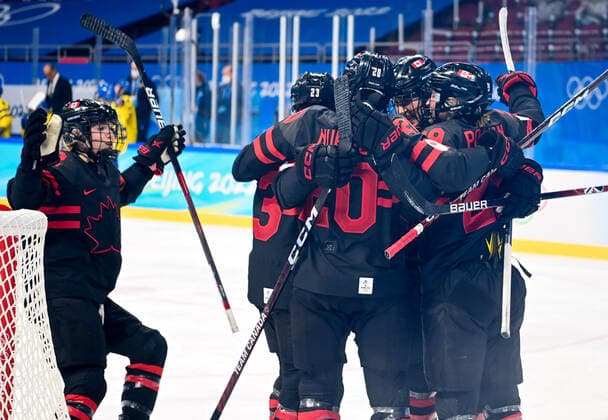 (220211) -- BEIJING, Feb. 11, 2022 -- Players of Canada celebrate scoring during the Ice hockey, Eishockey women s play-off quarterfinal between Canada and Sweden at Wukesong Sports Centre in Beijing, capital of China, Feb. 11, 2022. ) (BEIJING2022)CHINA-BEIJING-ICE HOCKEY-WOMEN S PLAY-OFF-QUARTERFINAL-CAN VS SWE (CN) LixRan 