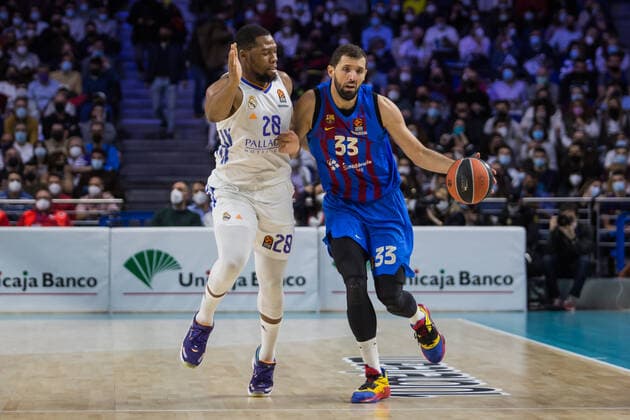 Spain: Real Madrid vs FC Barcelona, Barca Guerschon Yabusele (L) and Nikola Mirotic (R) during FC Barcelona victory over Real Madrid 68 - 86 in Turkish Airlines Euroleague regular season game (round 26) celebrated in Madrid (Spain) at Wizink Center. February 11th 2022. Madrid Madrid Spain Copyright: JuanxCarlosxGarcíaxMate